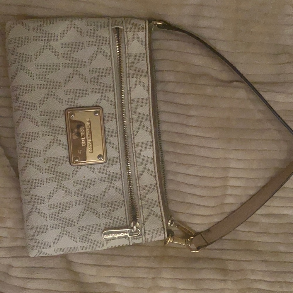 Michael Kors bag. Gold and white colored. Hardly used.